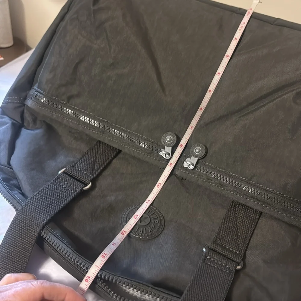 Kipling Black Duffel Bag, new, outside pockets, inside pockets, unisex